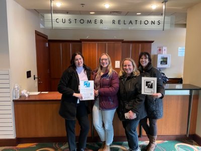 Photo of Dr. Cienkowski, Katharine Cartwright, and Allegra Klein at the Bushnell