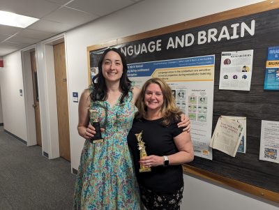 photo of Kacie and Nicole with trophies