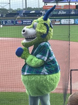 Photo of the Yardgoats mascot, Chompers, with a CI