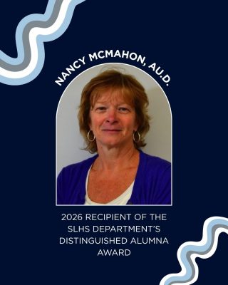 Headshot of Dr. Nancy McMahon, Au.D., against a blue background